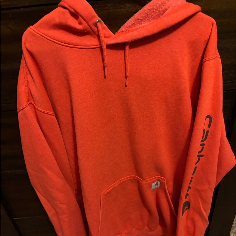 This is a Men’s Carhartt XXL tall, infrared red hoodie.
